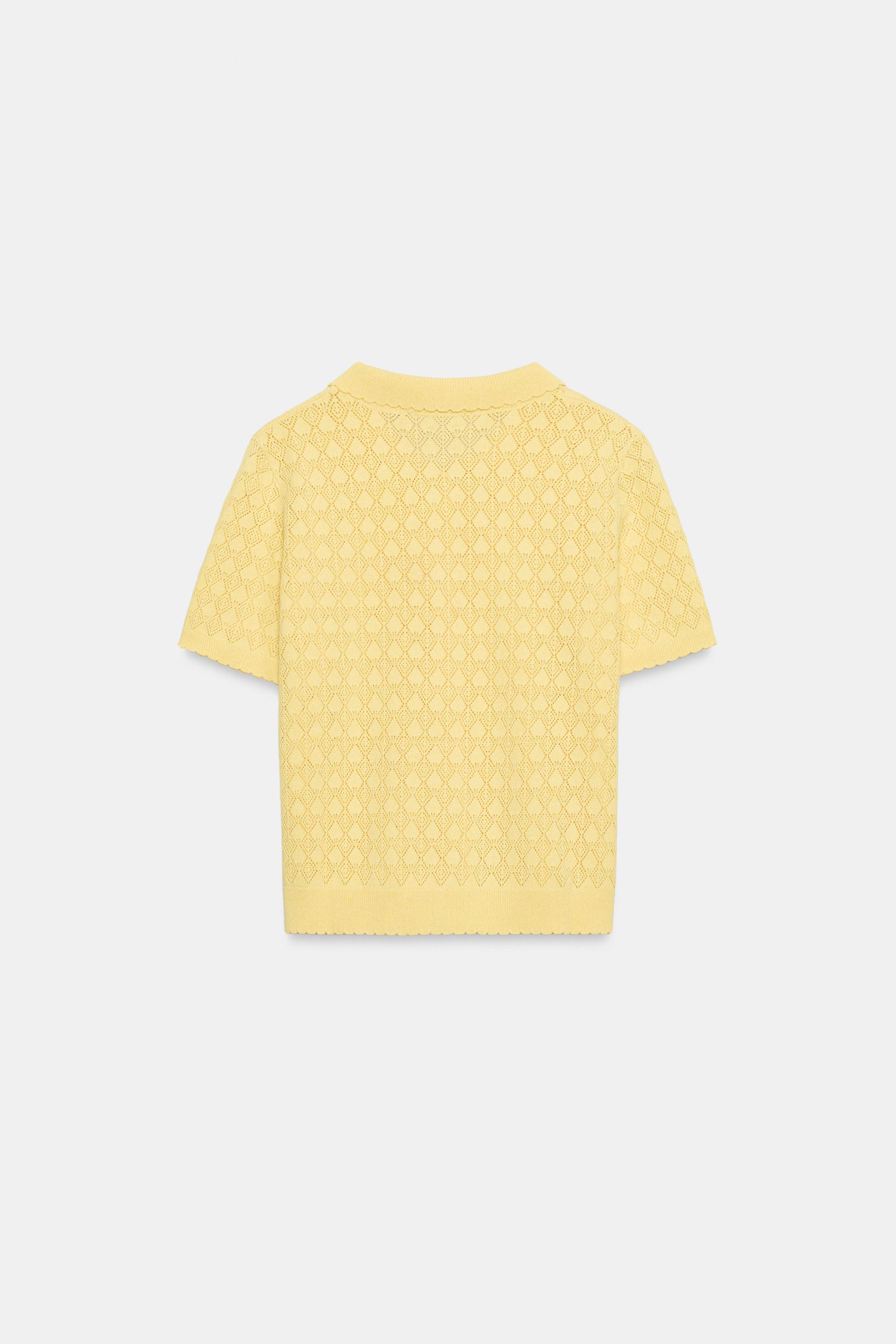 GILET POLO EN MAILLE À MANCHES COURTES